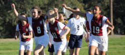 Students shout loudly on the sportsfield